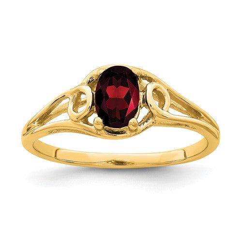 14K gold oval garnet ring with 6x4mm gemstone, elegant jewelry piece featuring a polished band and vibrant red stone.