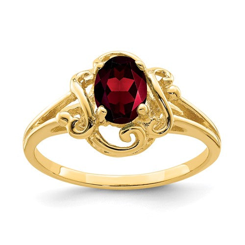 14k gold oval garnet ring with 7x5mm gemstone, elegant jewelry piece showcasing deep red color and fine craftsmanship.