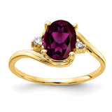14k gold ring featuring an 8x6mm oval Rhodolite Garnet and AA diamonds, crafted by Solomon Jewelers.