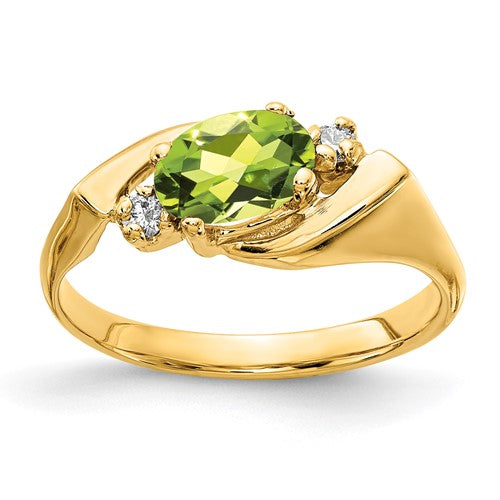 14k gold ring featuring a 7x5mm oval peridot gemstone and AA-grade diamonds, crafted by Solomon Jewelers.