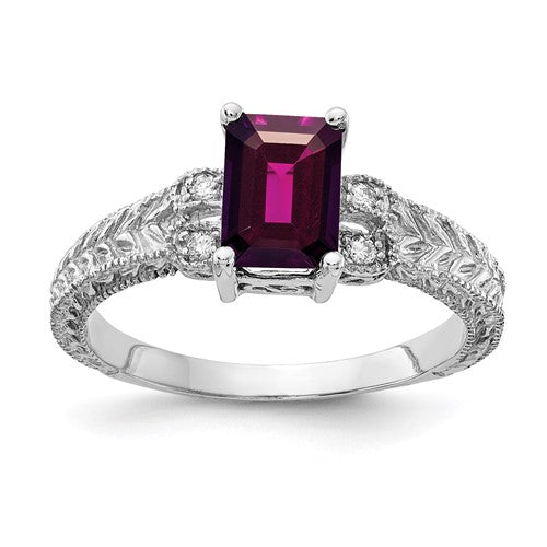14k white gold ring featuring a 7x5mm emerald cut rhodolite garnet and AA diamond accents, elegant jewelry from Solomon Jewelers