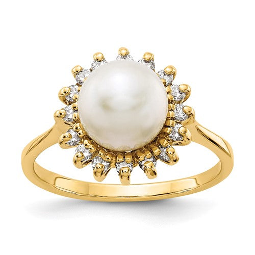 14k gold ring featuring 7.5mm cultured pearl and diamond accents, showcasing elegant jewelry design.