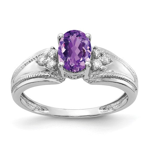 14k white gold ring featuring a 7x5mm oval amethyst and AA diamonds, crafted by Solomon Jewelers.