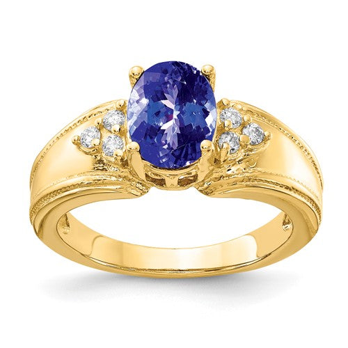 14k gold oval Tanzanite and AA diamond ring featuring 8x6mm stones, elegant jewelry piece from Solomon Jewelers.