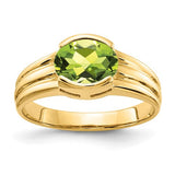 14k gold oval peridot ring with 8x6mm gemstone, elegant jewelry piece from Solomon Jewelers.
