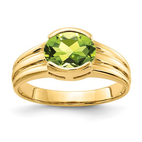 14k gold oval peridot ring with 8x6mm gemstone, elegant jewelry piece from Solomon Jewelers.