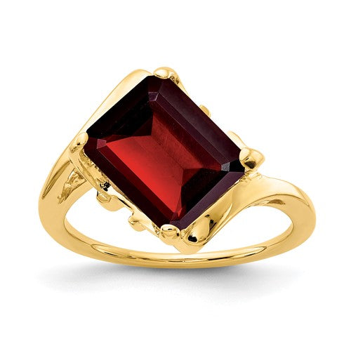 14k gold emerald cut garnet ring featuring a 10x8mm gemstone, elegant jewelry piece from Solomon Jewelers.