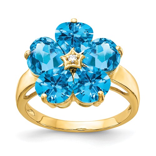 14k gold ring featuring a 6mm heart-shaped blue topaz and AA-grade diamonds, elegant jewelry piece from Solomon Jewelers
