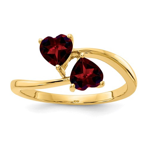 14k gold heart-shaped garnet ring featuring a 5mm gemstone, crafted by Solomon Jewelers, showcasing elegant jewelry design.