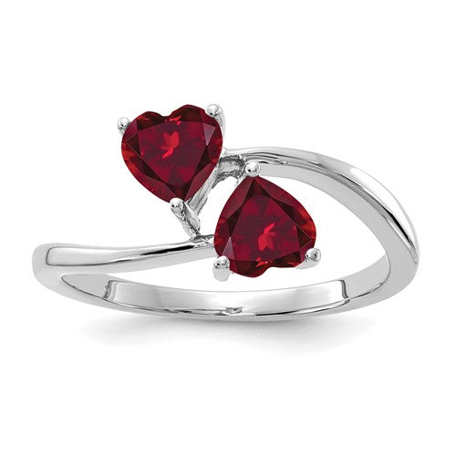 14k white gold ring with a 5mm heart-shaped created ruby, elegant jewelry piece by Solomon Jewelers.