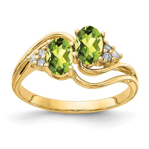 14k gold ring featuring a 6x4mm oval peridot gemstone and AA diamond accents, elegant jewelry ring from Solomon Jewelers