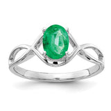 14k white gold oval emerald ring featuring a 7x5mm emerald gemstone, elegant jewelry piece from Solomon Jewelers.