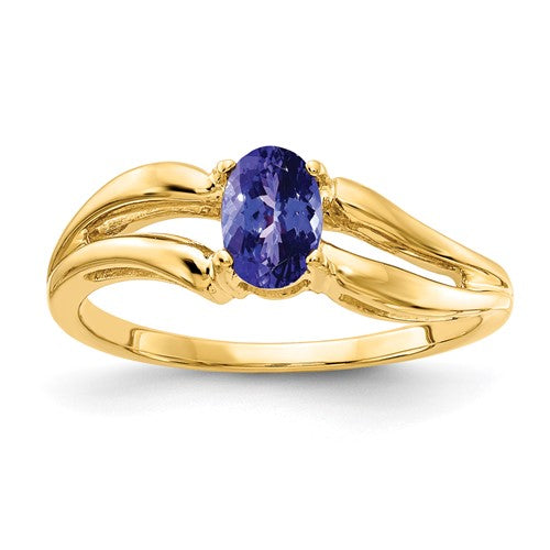 14k gold oval Tanzanite ring featuring a 6x4mm gemstone, elegant jewelry piece from Solomon Jewelers.