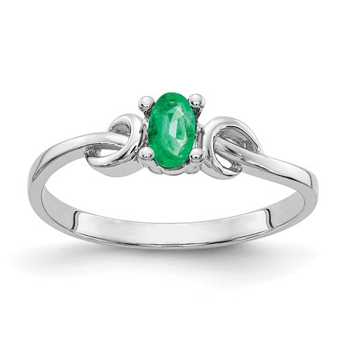 14k white gold oval emerald ring with a 5x3mm gemstone, elegant jewelry piece from Solomon Jewelers.