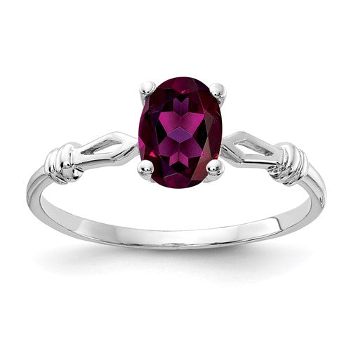 14k white gold ring with a 7x5mm oval rhodolite garnet gemstone, crafted by Solomon Jewelers.