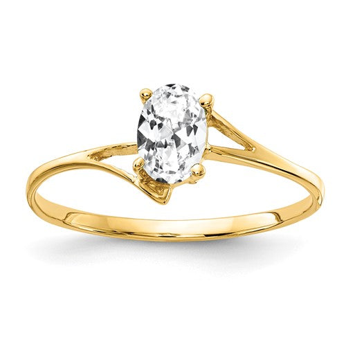 14k gold oval cubic zirconia ring with 6x4mm stone, elegant jewelry piece from Solomon Jewelers.