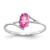 14k white gold ring featuring a 6x4mm oval pink sapphire, elegant jewelry piece from Solomon Jewelers.