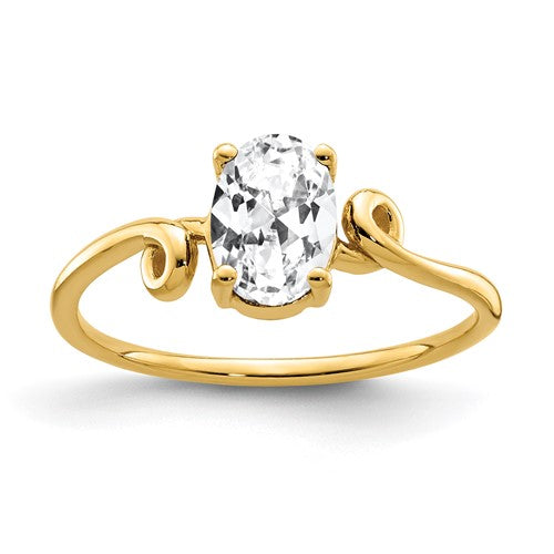 14k gold oval cubic zirconia ring with 7x5mm stone, elegant jewelry piece showcasing sparkling center stone.