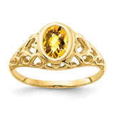14k gold oval citrine checker ring with 7x5mm gemstone, jewelry ring by Solomon Jewelers, featuring a polished gold band.
