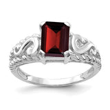 14k white gold emerald cut garnet ring with an 8x6mm gemstone, crafted by Solomon Jewelers.