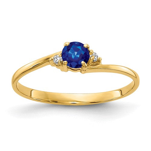 14k gold sapphire and AA diamond ring featuring a 4mm gemstone, elegant jewelry ring from Solomon Jewelers.