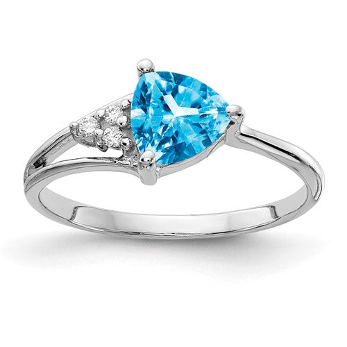 14k white gold ring with a 6mm blue topaz gemstone and AA-grade diamonds, jewelry ring by Solomon Jewelers.