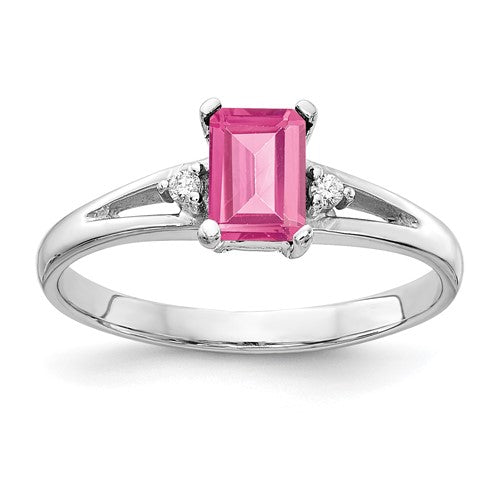 14k white gold ring featuring a 6x4mm emerald cut pink tourmaline with AA-grade diamonds, designed by Solomon Jewelers.