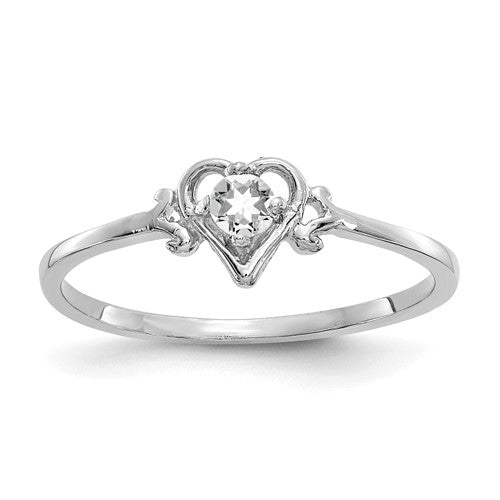 14K white gold ring with a heart-shaped white topaz birthstone, showcasing elegant jewelry design.