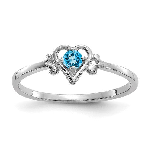 14K white gold blue topaz heart-shaped birthstone ring, elegant jewelry piece with a sparkling blue gemstone.