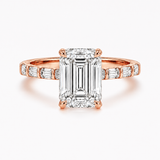 14k gold diamond engagement ring with a baguette diamond band and emerald-cut lab-grown diamonds, Solomon Jewelers.