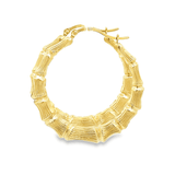 Gold bamboo hoop earrings showing the polished, textured bamboo pattern from Solomon Jewelers