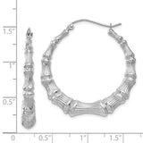 14K white gold bamboo hoop earrings with a sleek, modern design featuring intricate bamboo-inspired detailing.
