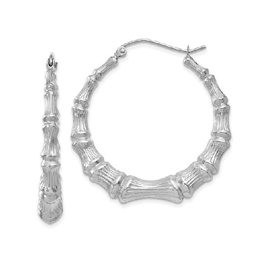 14K white gold bamboo hoop earrings with a sleek, natural design, crafted by Solomon Jewelers.