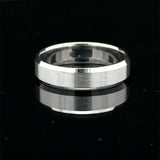 Brushed white gold wedding band with polished beveled edges available at Solomon jeweler Wichita Kansas.