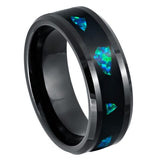 Black ring with blue gemstones on a white background