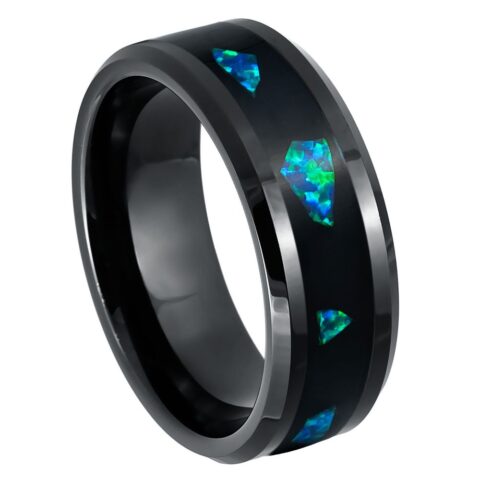 Black ring with blue gemstones on a white background