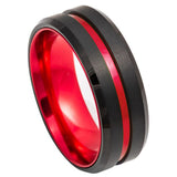 A black metallic band ring with a vibrant red inner lining and a thin red accent stripe, shown on a plain white background.