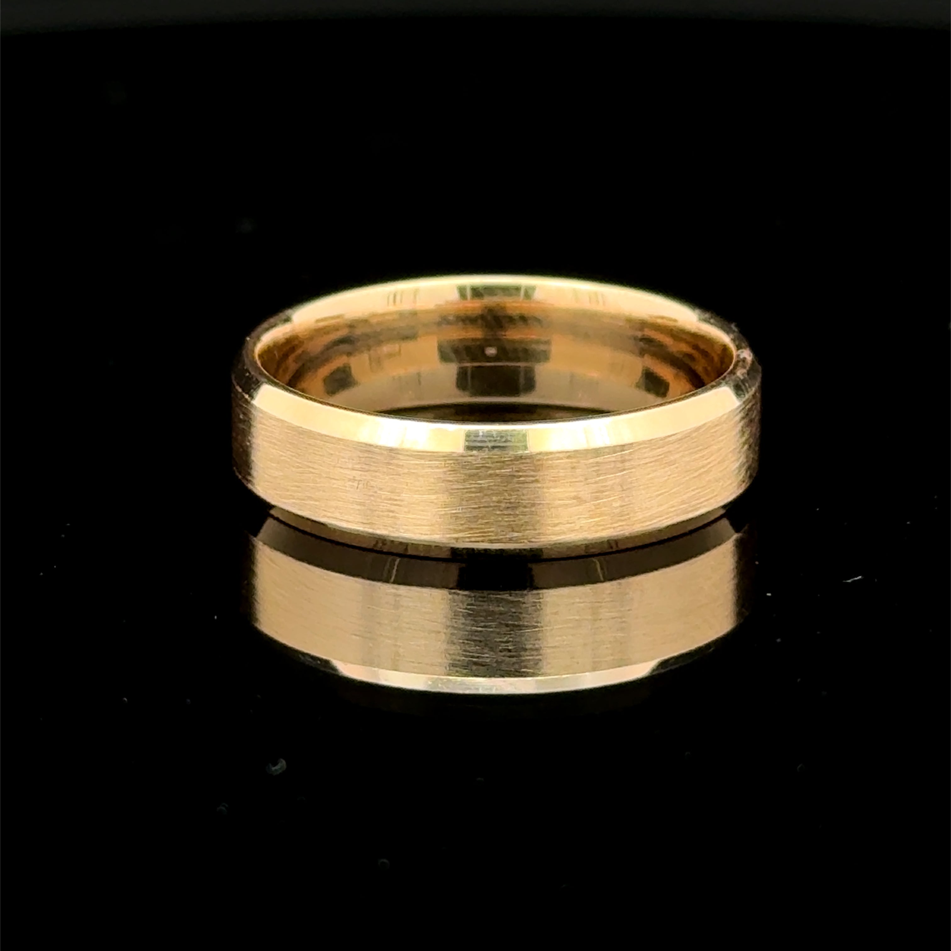 14 Karat Brushed yellow gold wedding band with polished beveled edges.