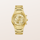 A gold-tone chronograph watch by Caravelle with a matching gold-tone metal link bracelet, shown against a light beige background.