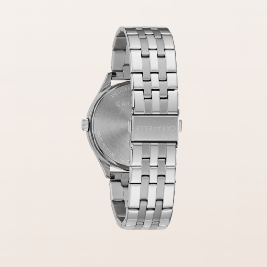 Silver stainless steel watch band with a multi-link design, shown from the back with the brushed metal case visible, on a light beige background.
