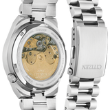 Citizen stainless steel automatic watch with a transparent back case showing the gold-toned mechanical movement, alongside the clasp side of the metal bracelet.