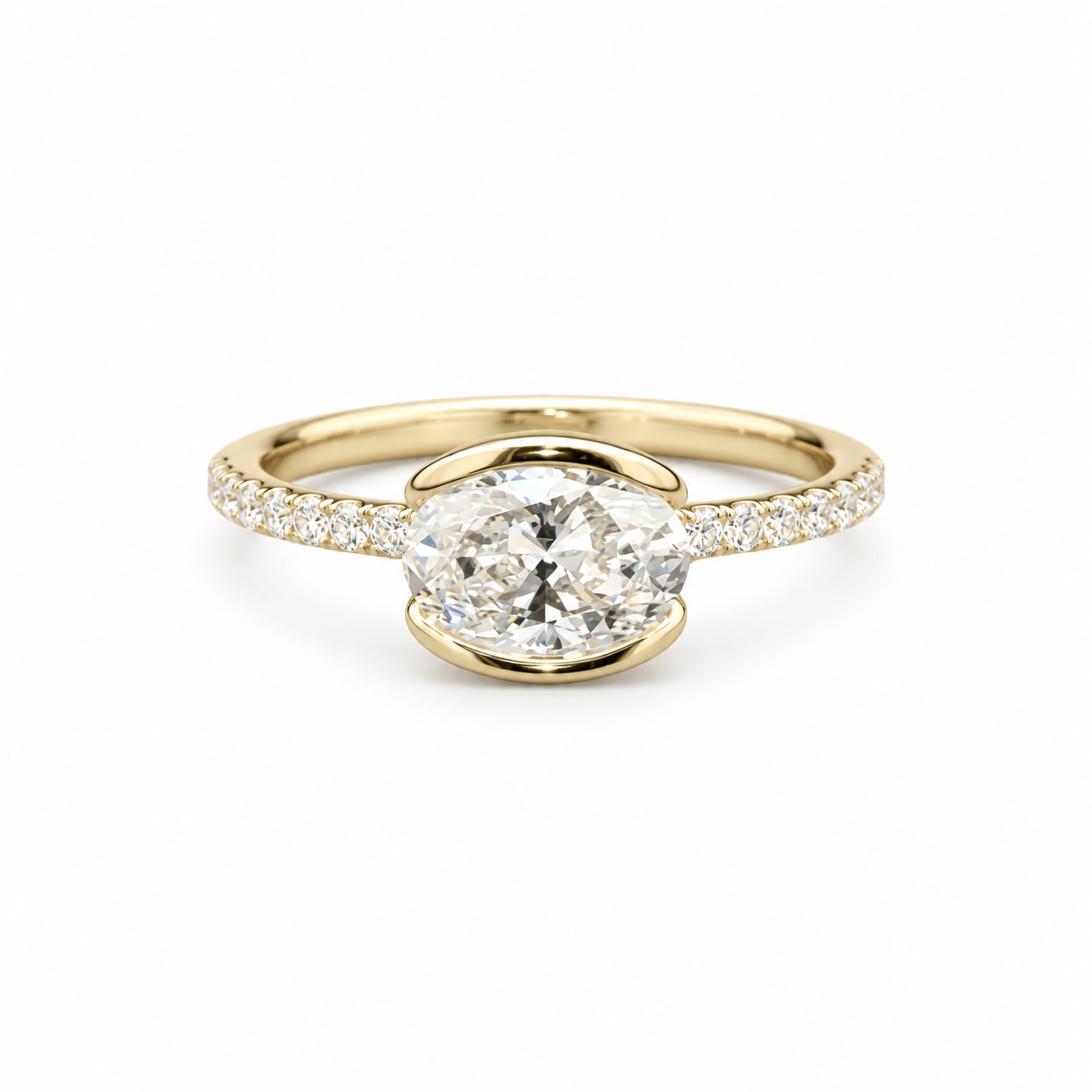 A yellow gold engagement ring featuring a large oval-cut center stone in a prong setting, with a pavé band set with small round stones, shown on a plain white background.