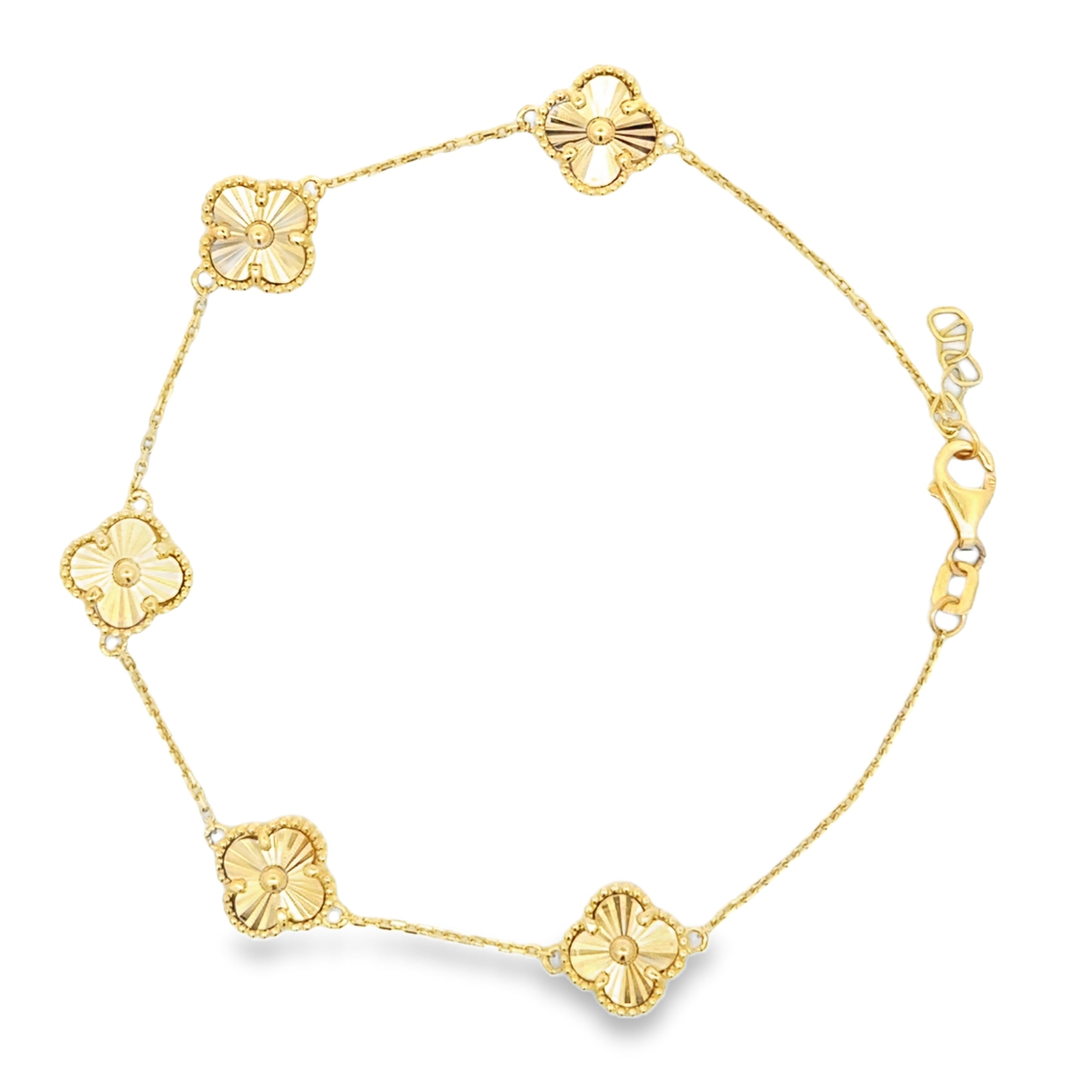 10K yellow gold clover style bracelet with a delicate floral motif and textured design, crafted by Solomon Jewelers.