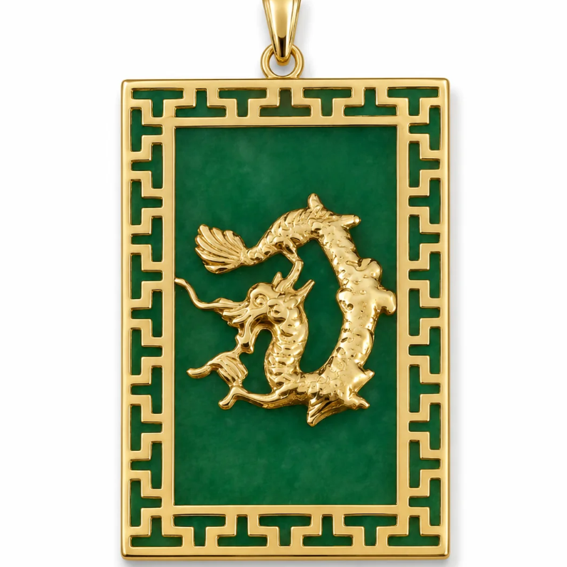 A rectangular gold pendant featuring a green enamel background with a raised gold dragon motif in the center and a geometric border.