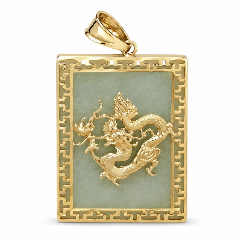 A gold pendant featuring a rectangular light green jade-like inlay with a raised gold dragon motif in the center, surrounded by a decorative gold border, shown on a plain white background.