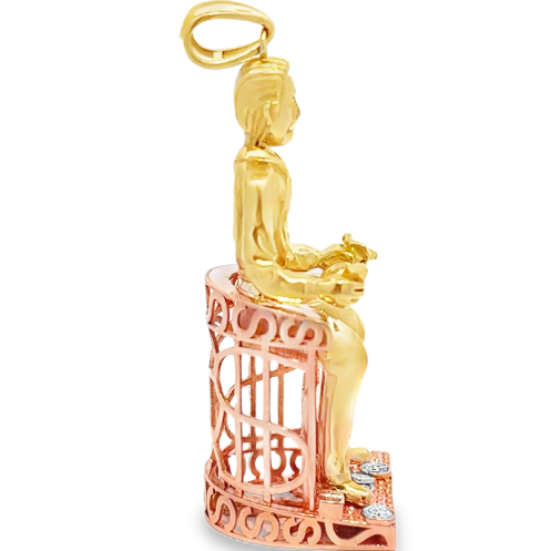 10K gold Jesús Malverde pendant featuring detailed religious iconography, crafted by Solomon Jewelers.