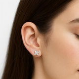 Side view of lily-cut floral petal lab diamond stud earrings in 14K gold