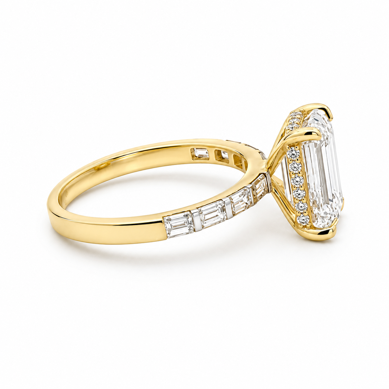 Emerald cut lab diamond engagement ring with 4.75 carats in 14k gold, featuring VS1 clarity and D color from Solomon Jewelers.