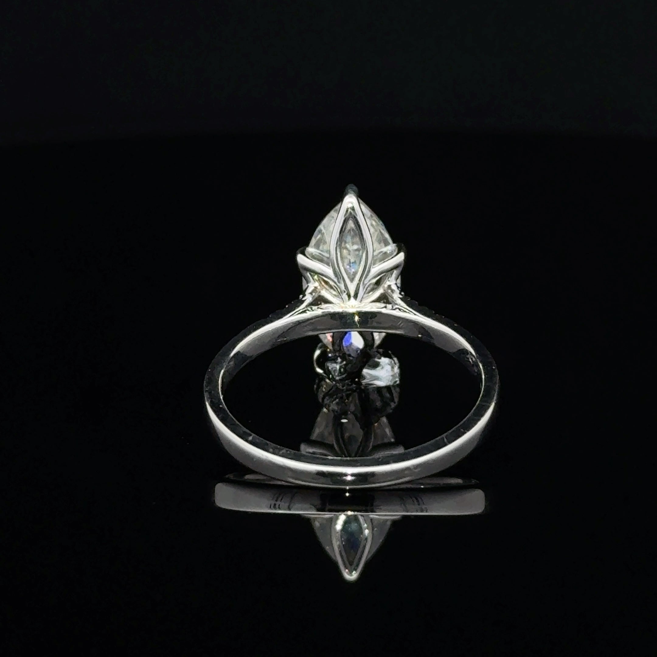 Marquise moissanite silver ring with six prongs and round sparkling shoulder accents