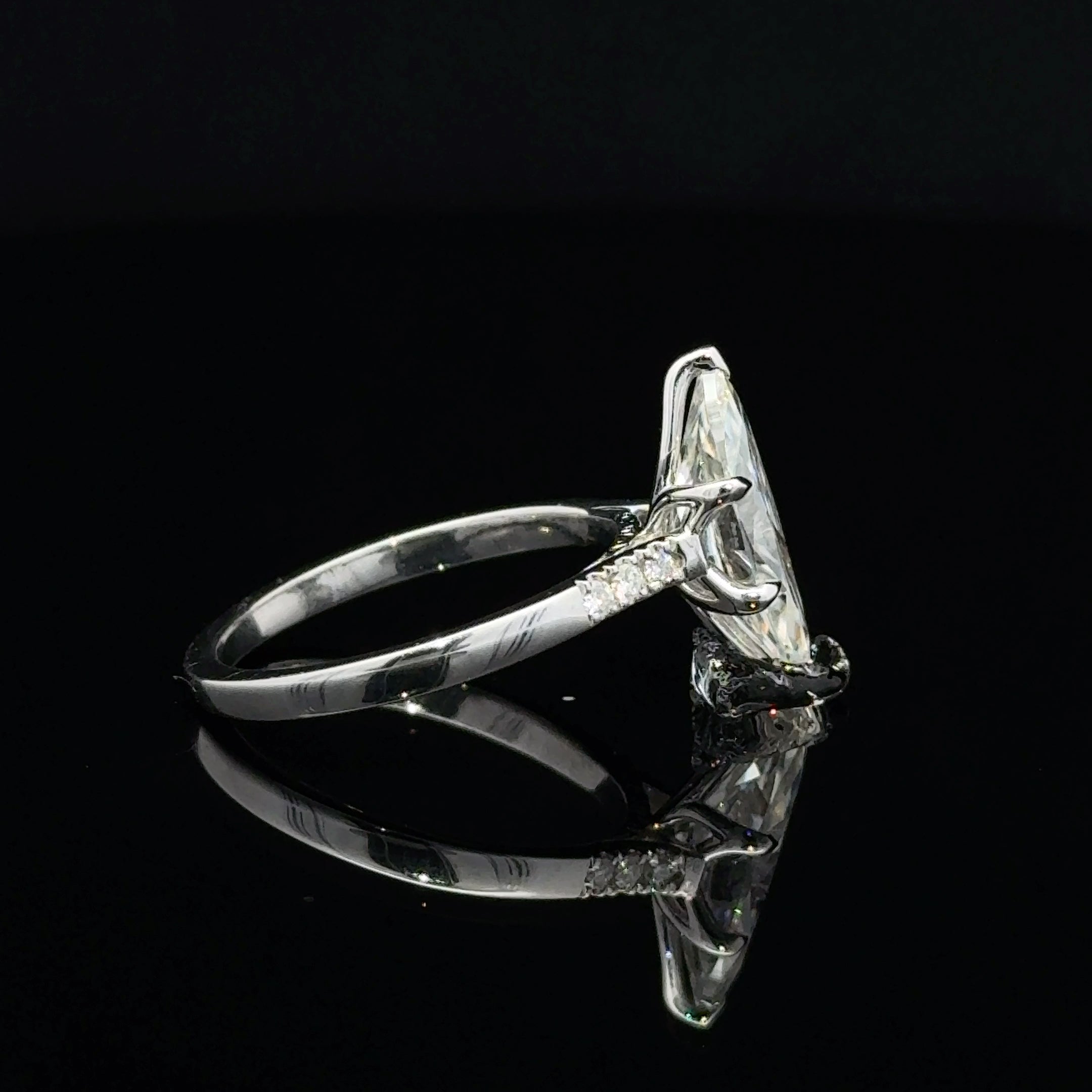 Marquise moissanite silver ring with six prongs and round sparkling shoulder accents